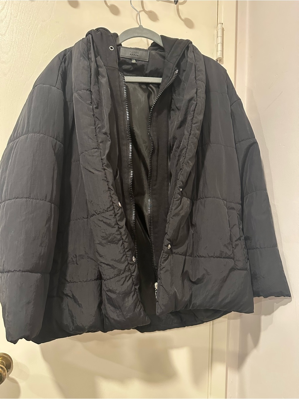 Women’s Black Puffer Jacket with Hood. Size XS. Missing belt